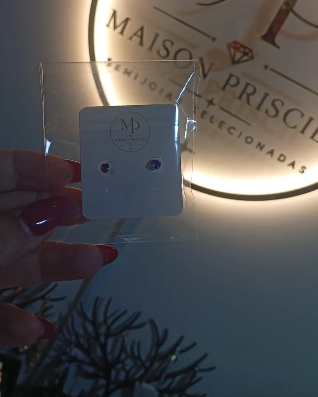 Brinco ponto de luz azul